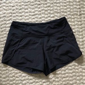 Black lulu lemon shorts, longer cut. Size 4.
